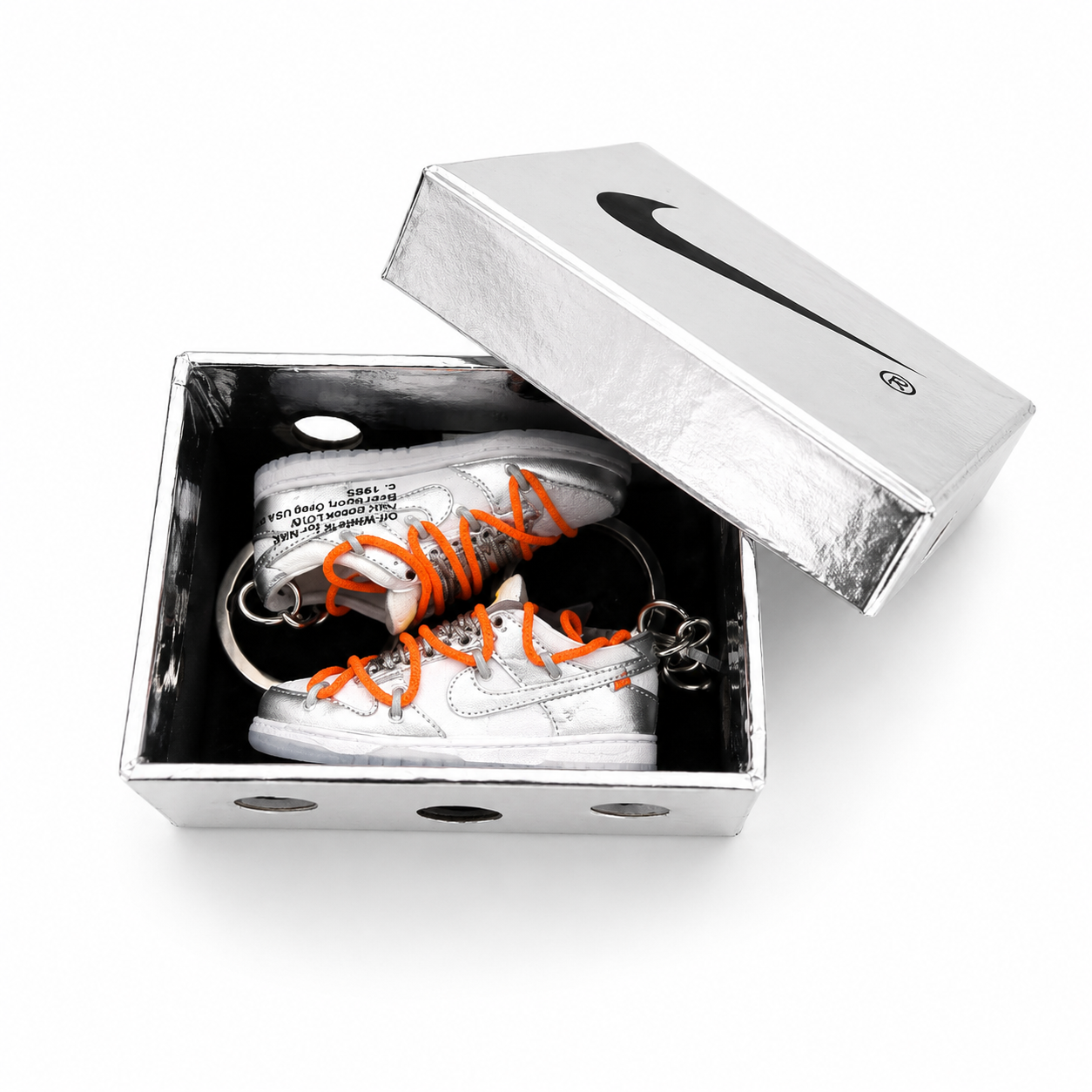 Dúo Off-White x Nike Dunk Low Silver en mini caja