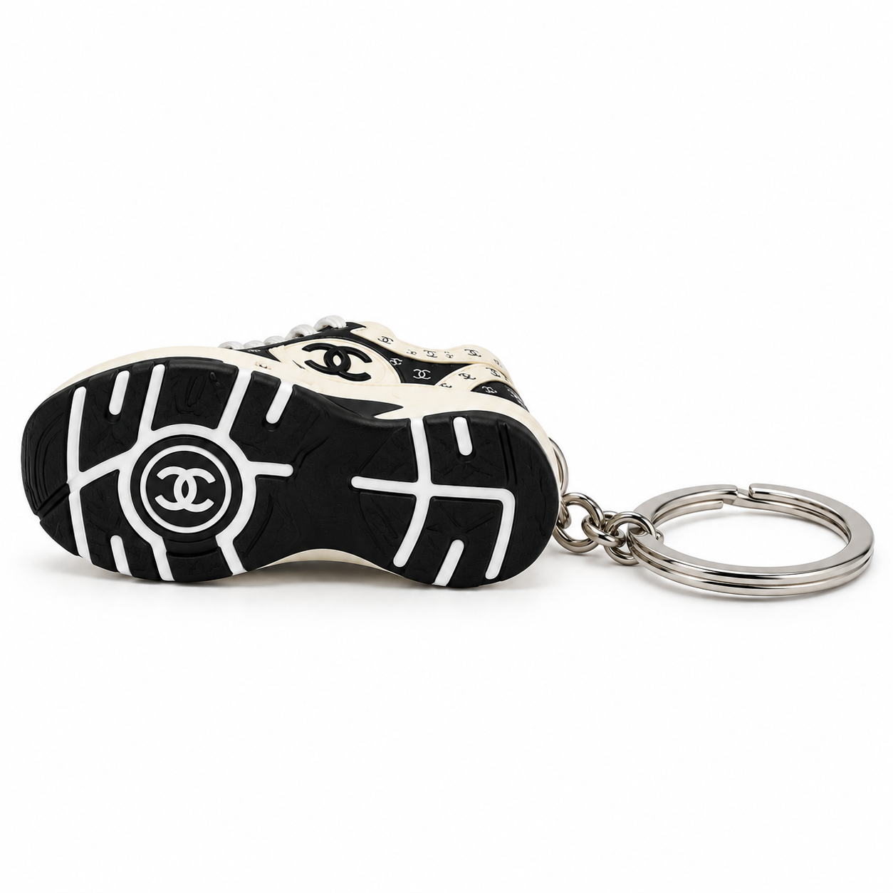 Mini sneaker Chanel CC Logo White Black vista de la suela