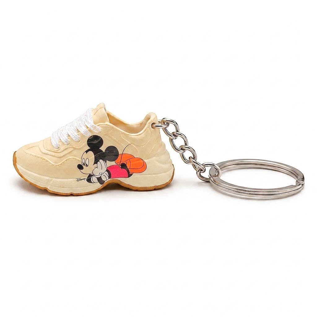 Mini sneaker Gucci Rhyton Mickey Mouse vista latera