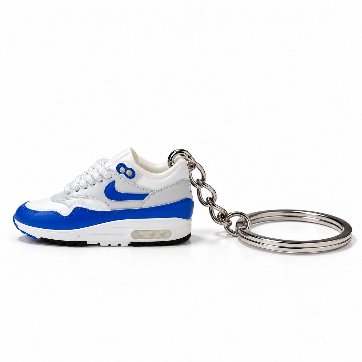 Mini sneaker Nike Air Max 1 Royal Blue vista lateral