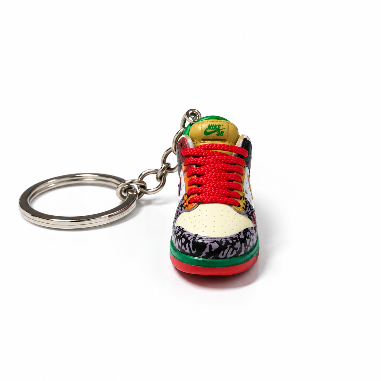 Mini sneaker Nike SB Dunk Low What The Dunk izquierda frontal