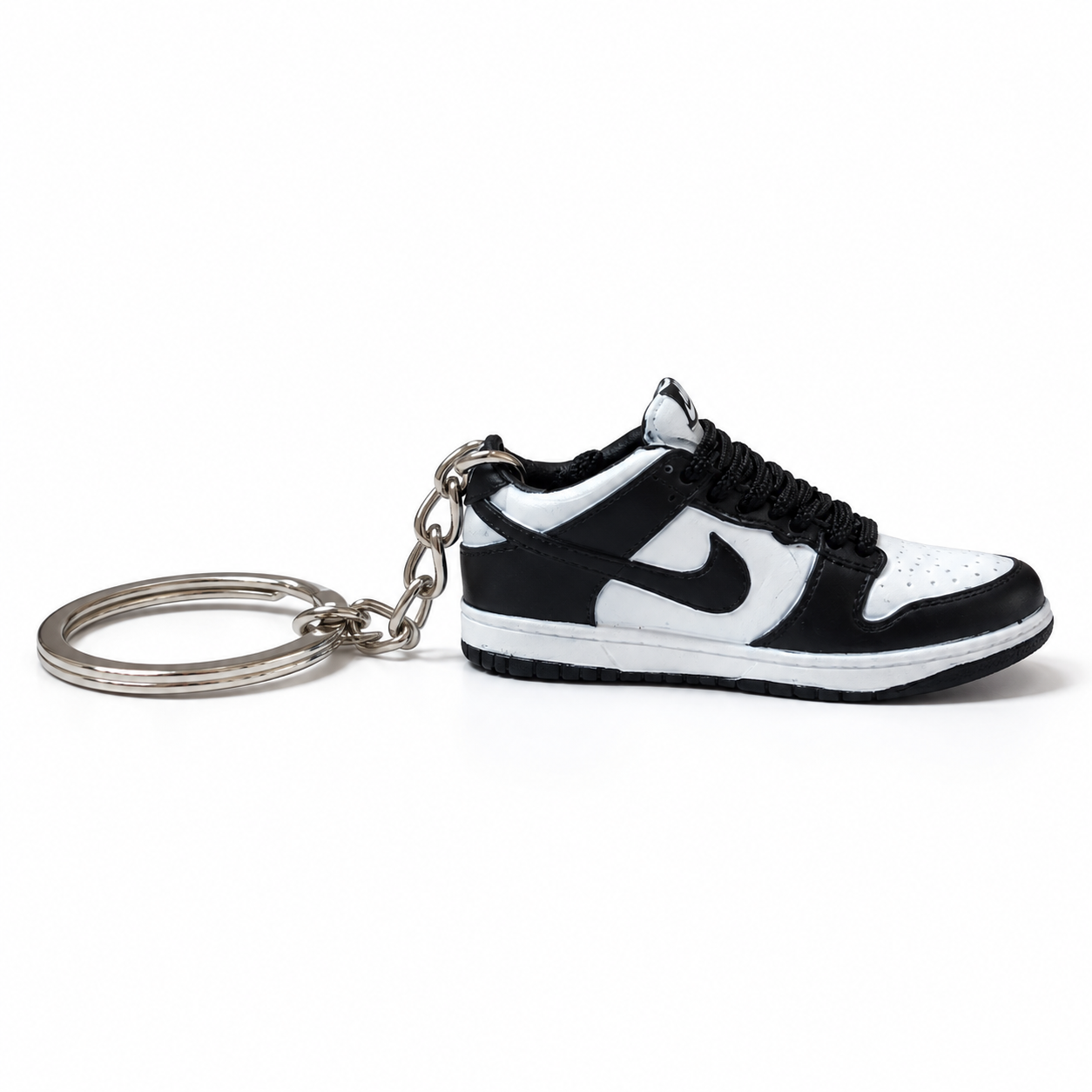Mini sneaker Nike Dunk Low Panda lateral opuesto