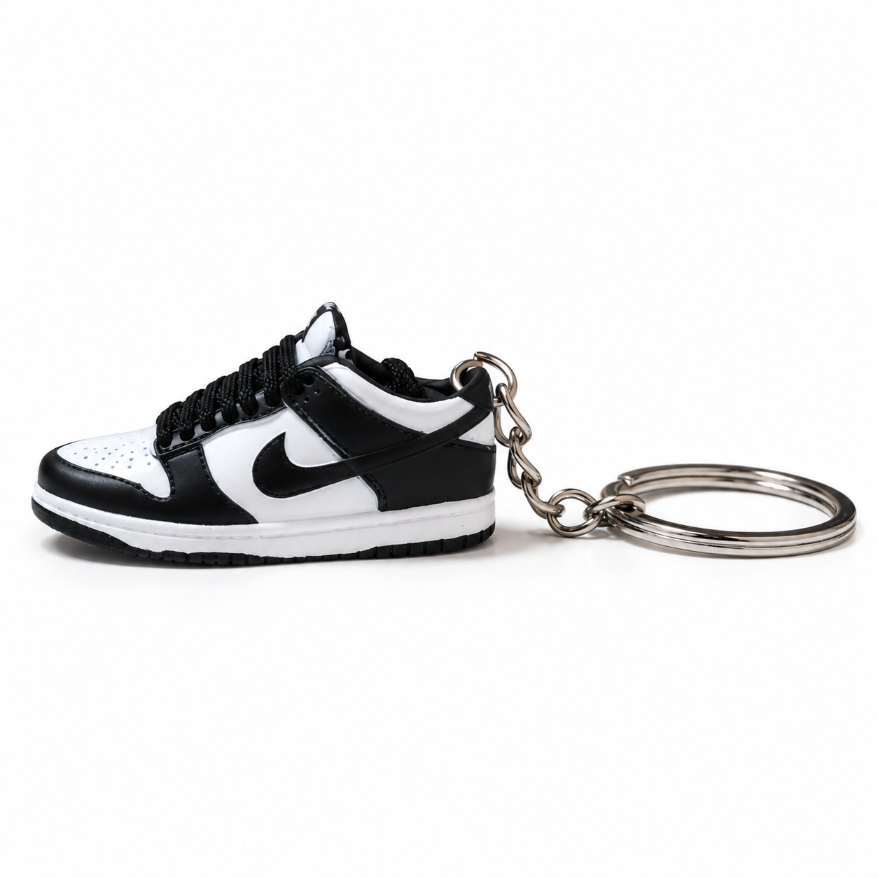Mini sneaker Nike Dunk Low Panda vista lateral