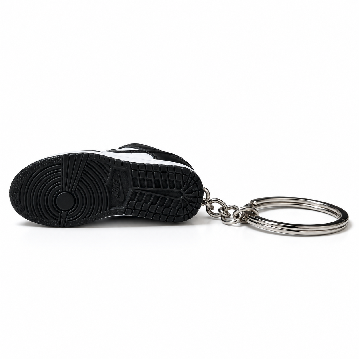 Mini sneaker Nike Dunk Low Panda vista de la suela